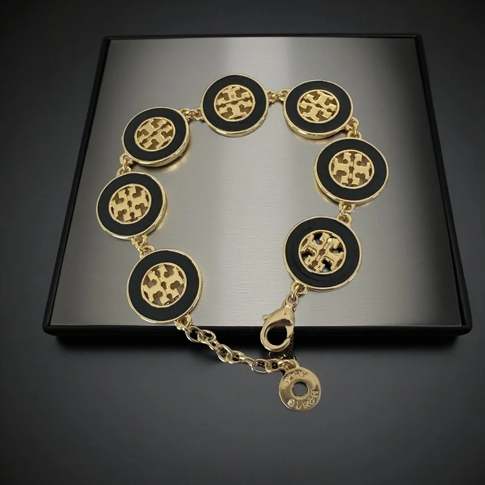96: Tory Burch 18kt gold plated bracelet - Picture 2 of 2